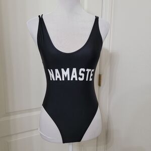 Black "Namaste" Bodysuit, Excellent Used Condition.  White Spellout.